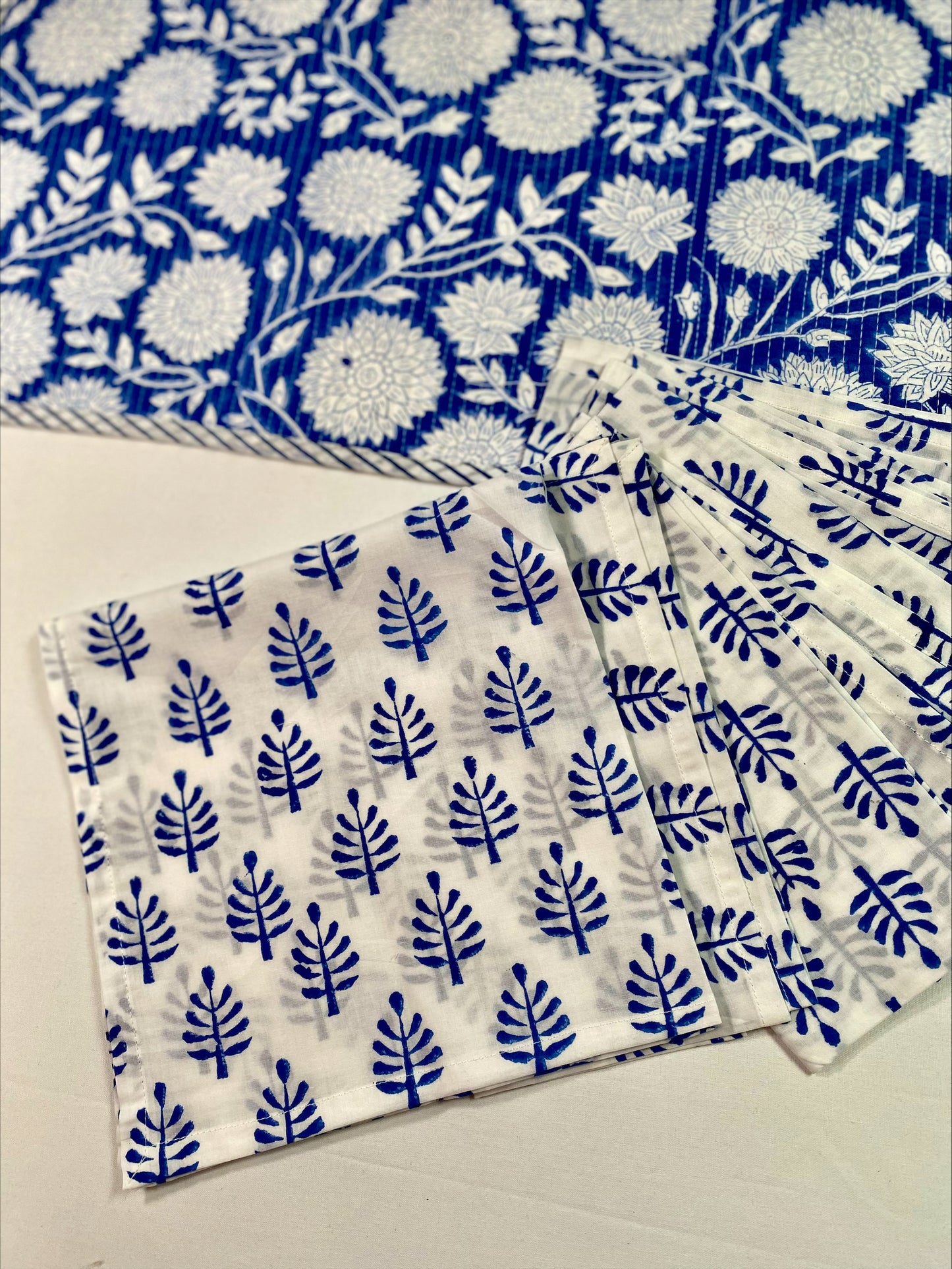 Hand block printed blue quilted reversible table mats with matching napkins