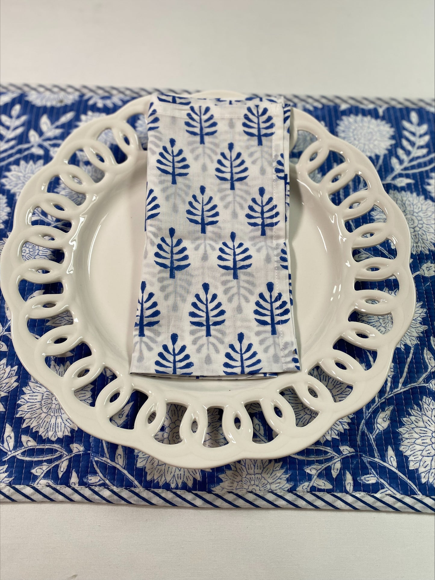 Hand block printed blue quilted reversible table mats with matching napkins