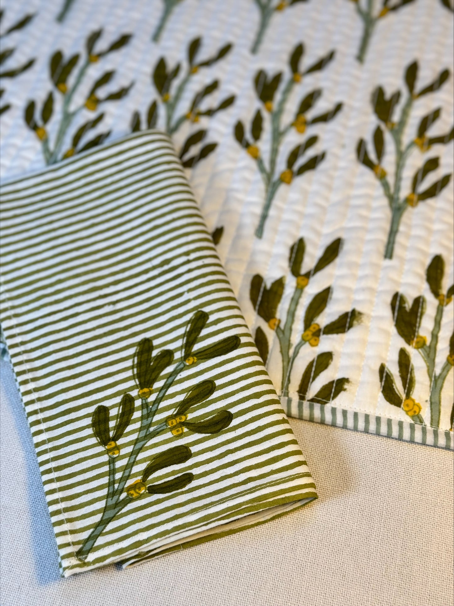 Hand block printed olive green mistletoe napkins - set of 2