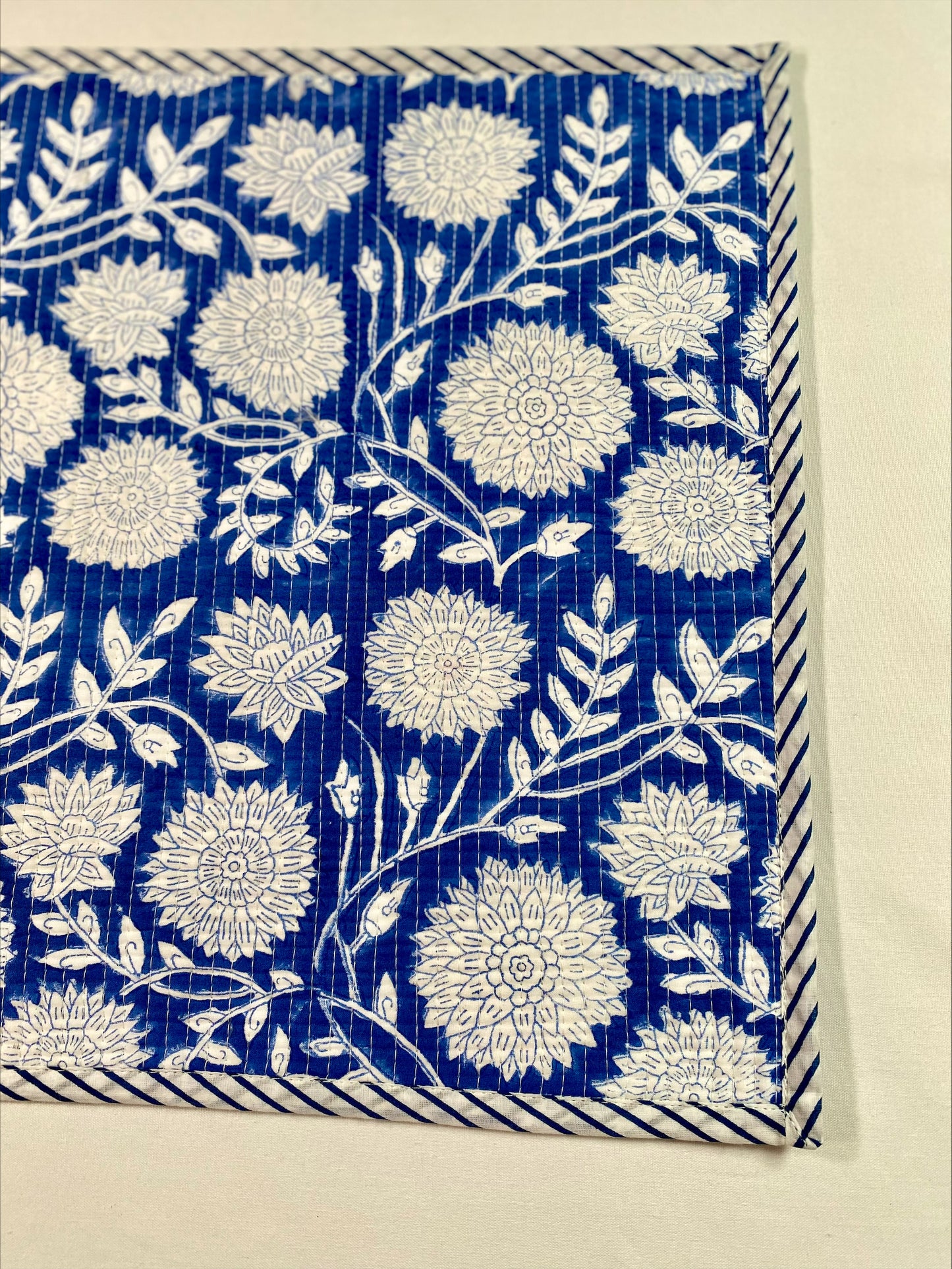 Hand block printed blue quilted reversible table mats with matching napkins
